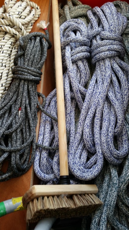 Ashortment ropes, deck brush