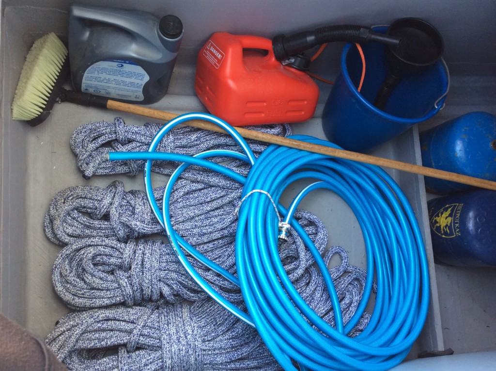Jerrycan for fuel , jerrycan for oil, fuel funnel,bucket,deck brush,ashortment of ropes,water hose,gas