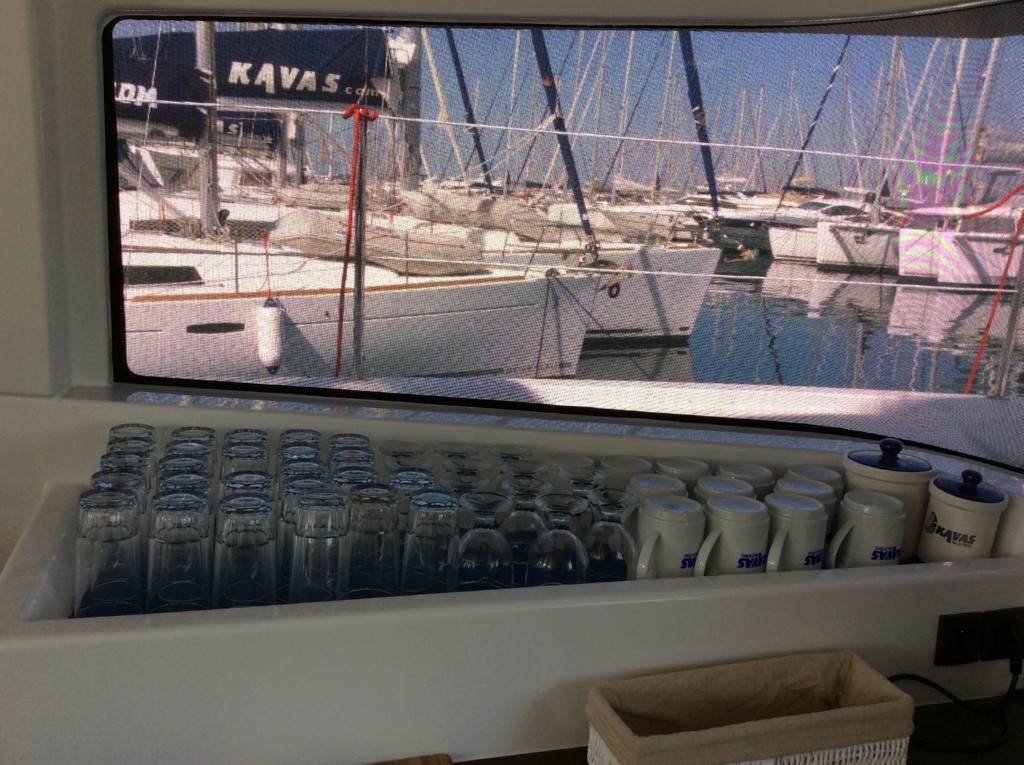 Wine and water glasses, coffee mugs, sugar and coffee vases